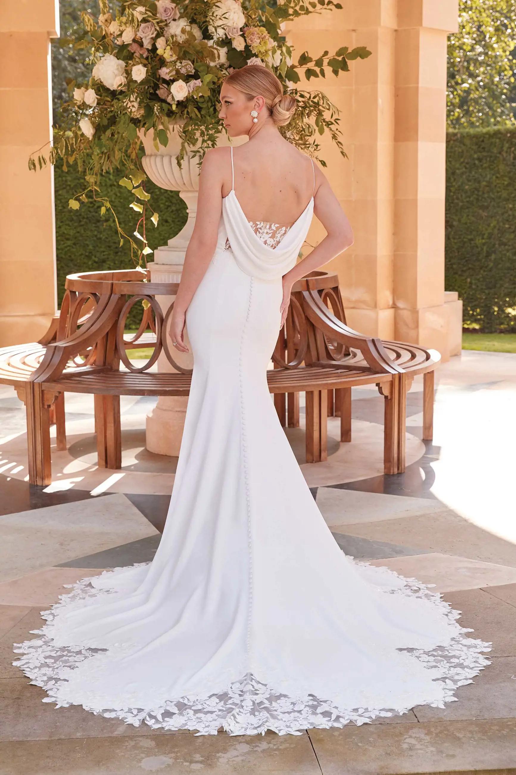 Model wearing a Sincerity by Justin Alexander gown