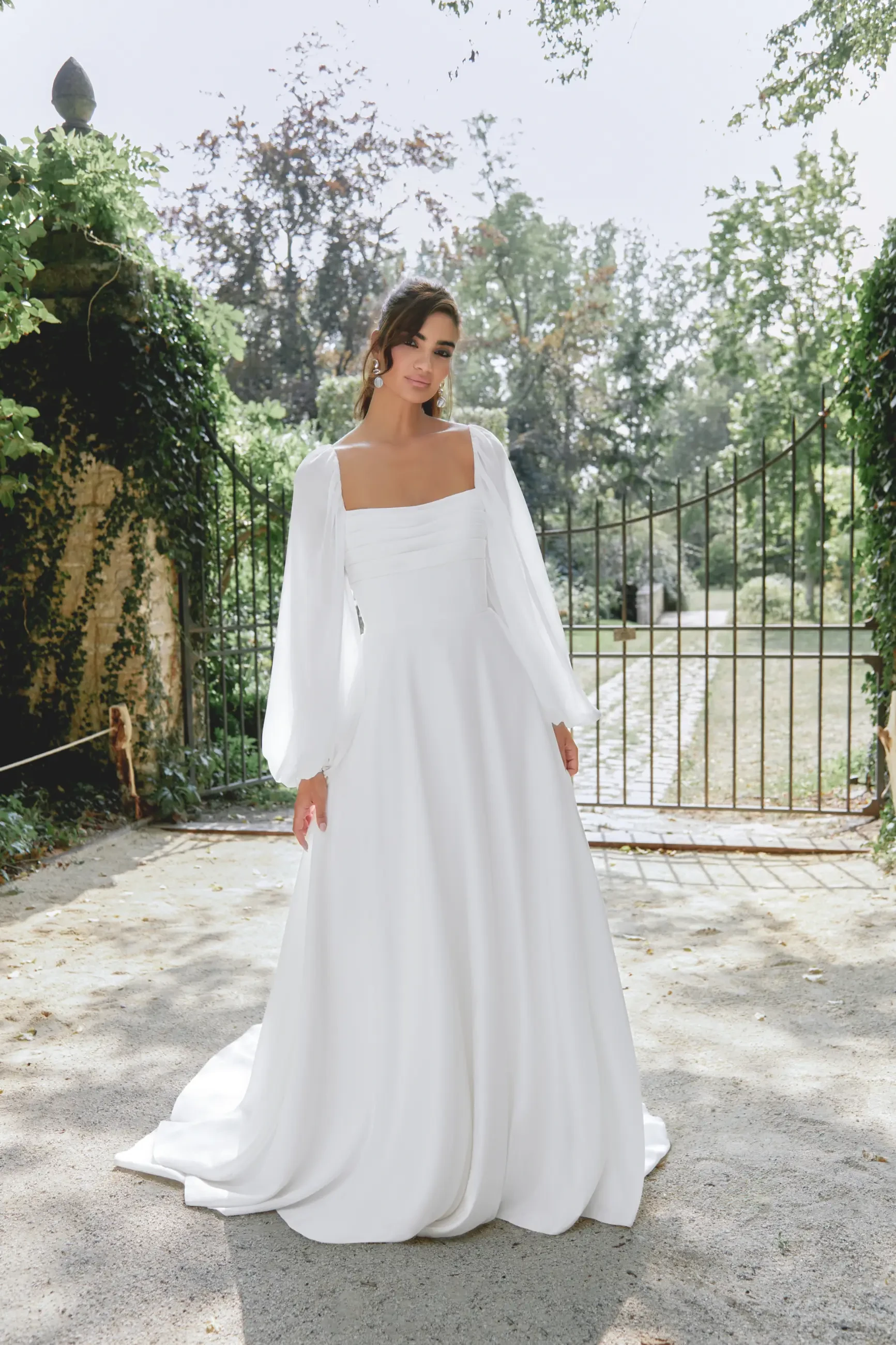 Model wearing a Sincerity by Justin Alexander gown