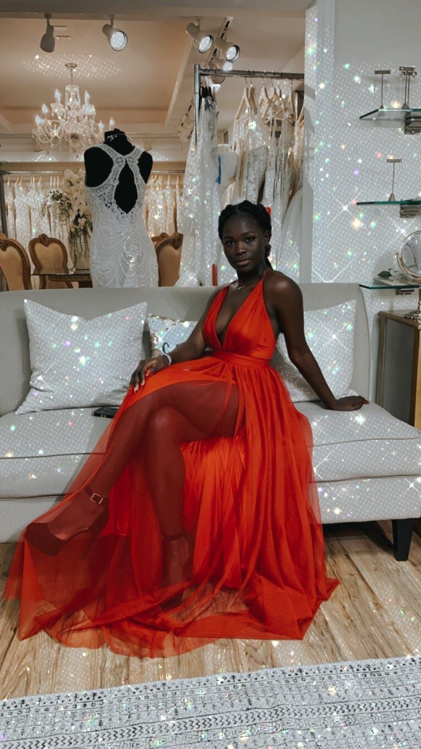 Photo of a real bride in a red gown