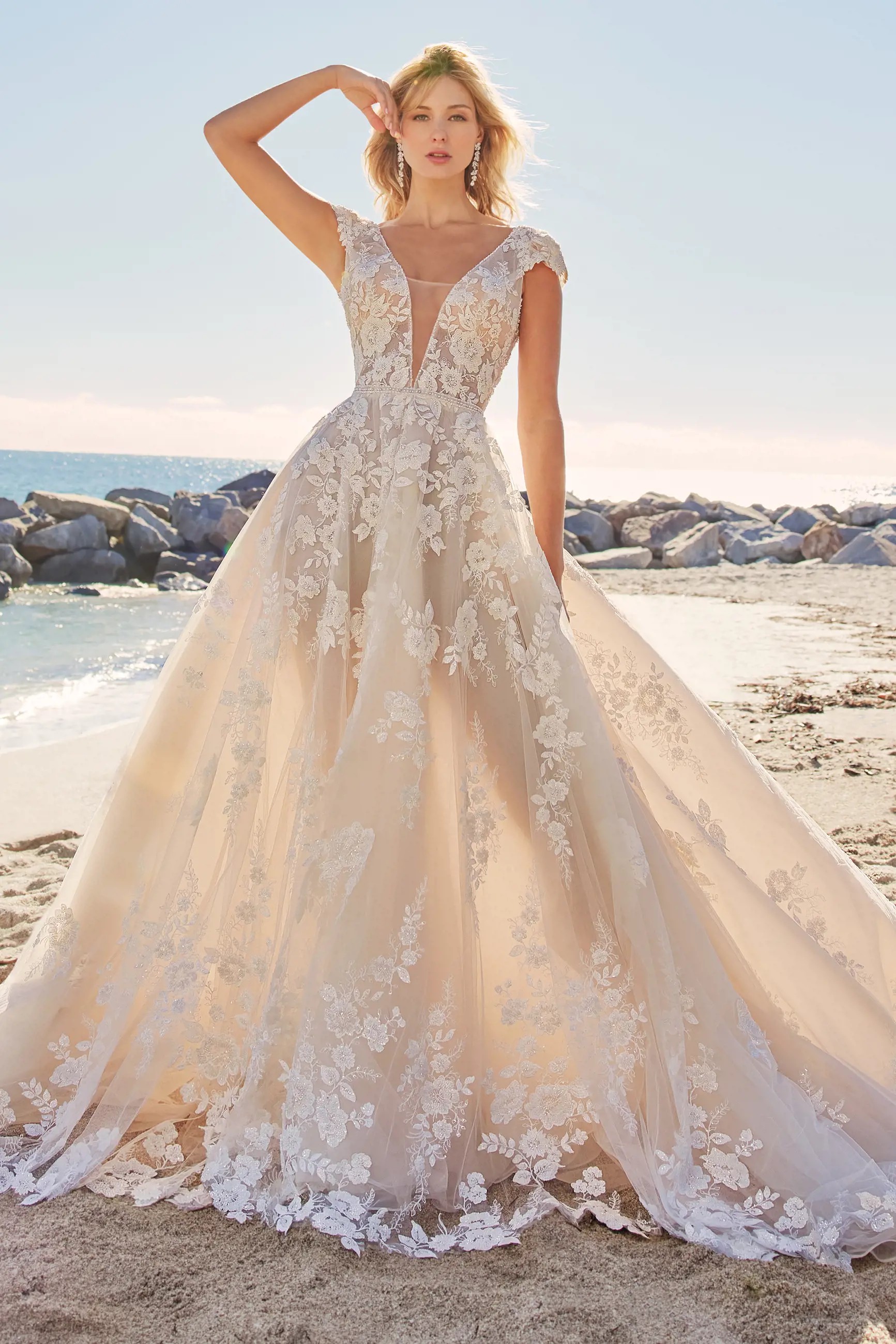Model wearing a Luxe by Martin Thornburg gown