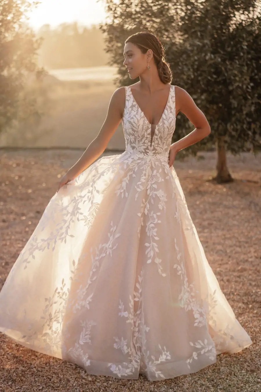 Model wearing a Allure Bridals gown