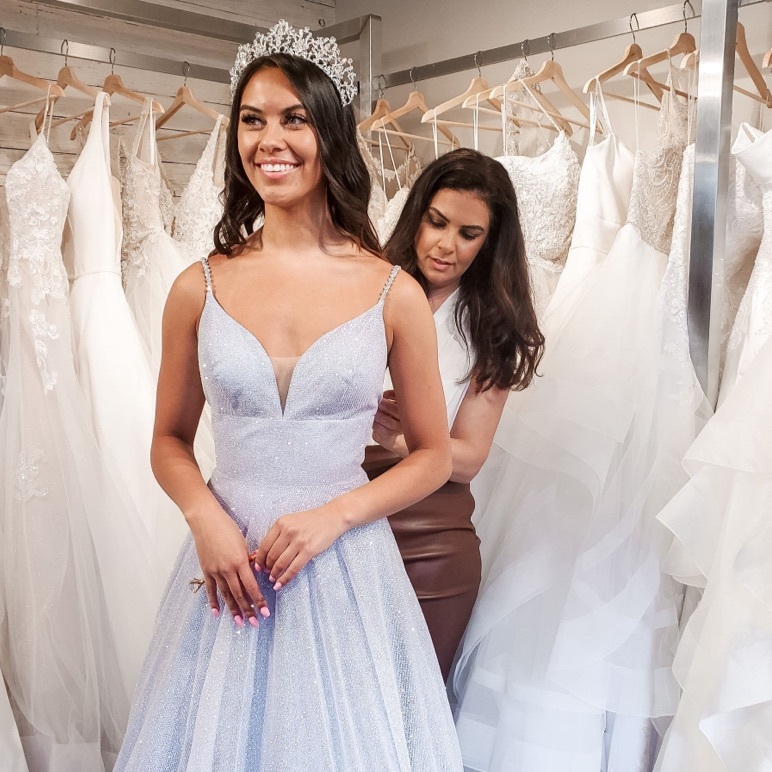 Photo of the real bride in a gray dress