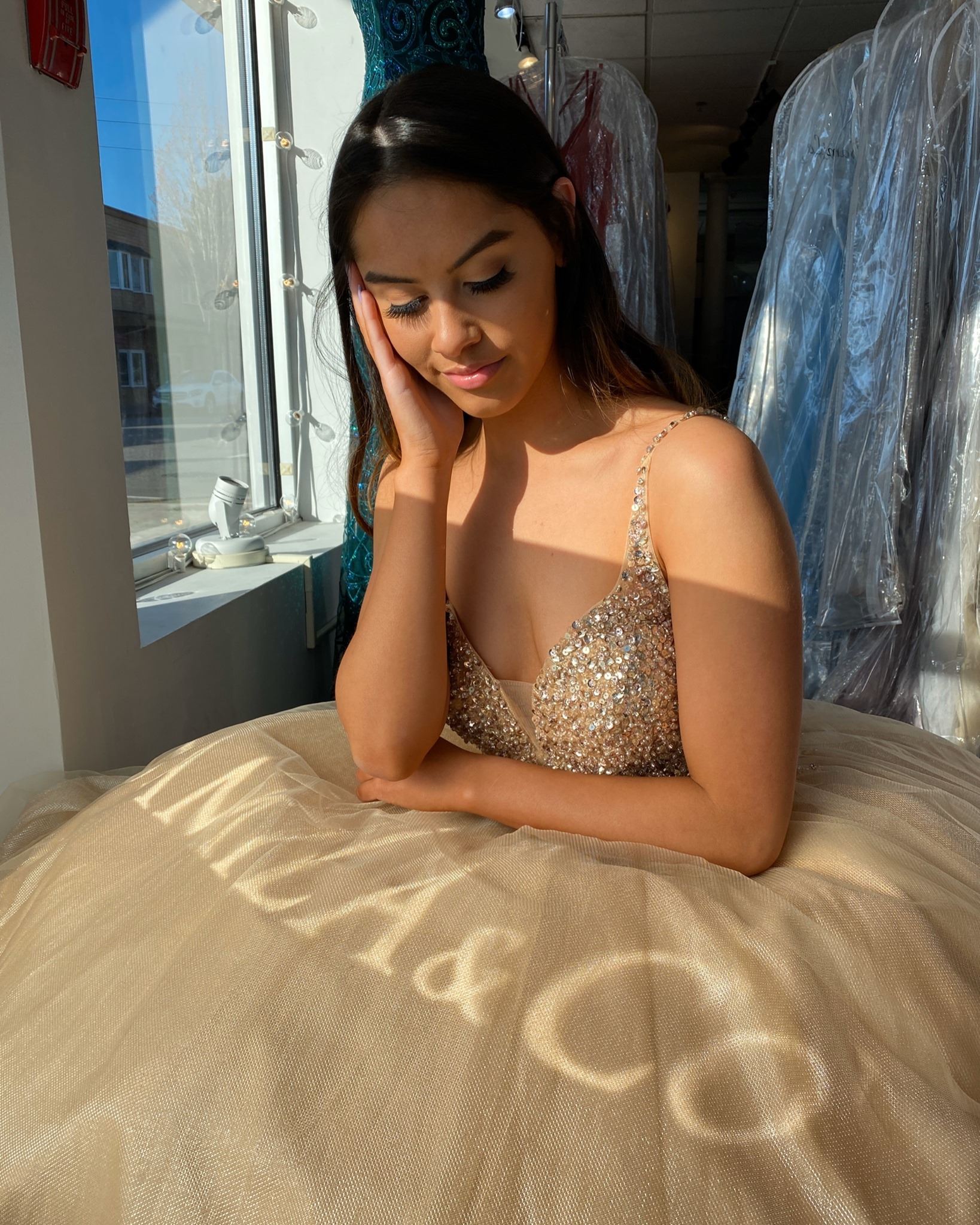 Photo of a real bride sitting near the window